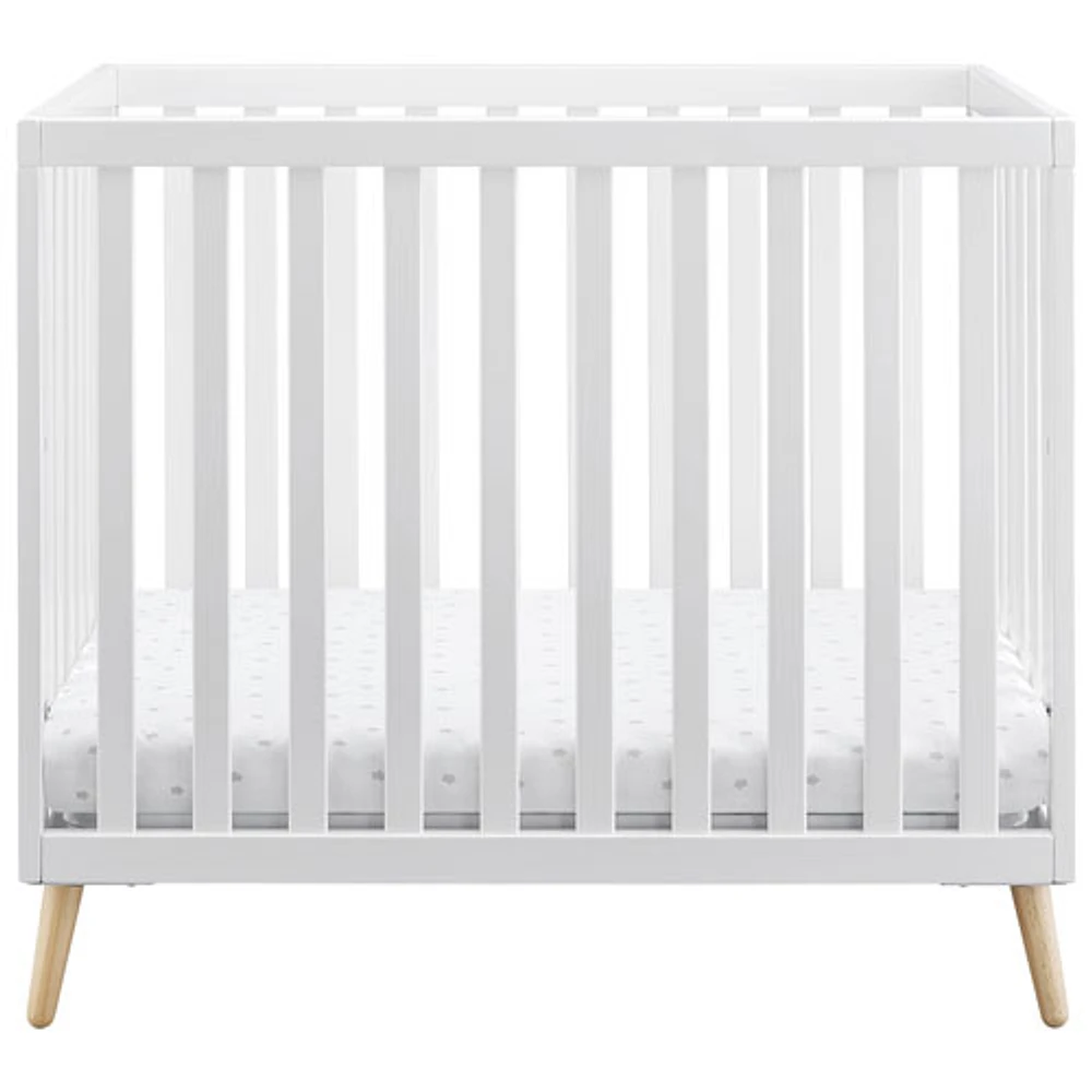 DELTA CHILDREN Delta Children Tucker Mini Crib with Mattress - Bianca White