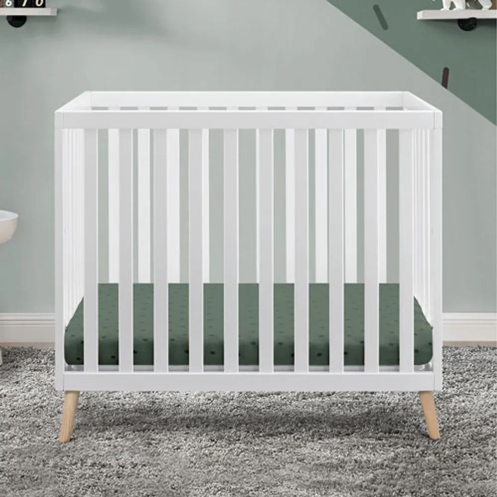 DELTA CHILDREN Delta Children Tucker Mini Crib with Mattress - Bianca White