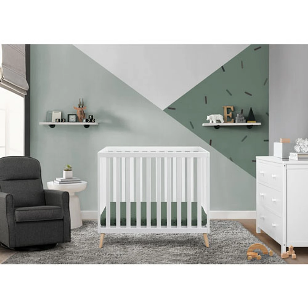 DELTA CHILDREN Delta Children Tucker Mini Crib with Mattress - Bianca White