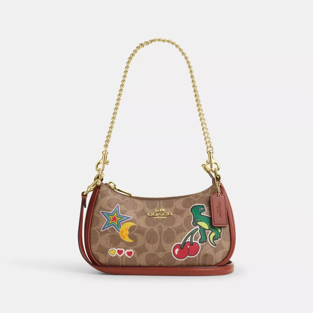 Teri Mini Crossbody Bag In Signature Canvas With Sticker Print